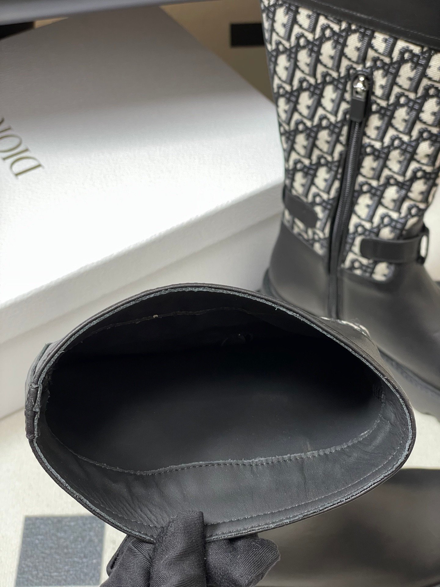 2025 Fall/Winter Dior Boots: Black calfskin and nylon mid-calf riding boots with cannage embroidery, classic letter buckle, fabric slip-on straight boots