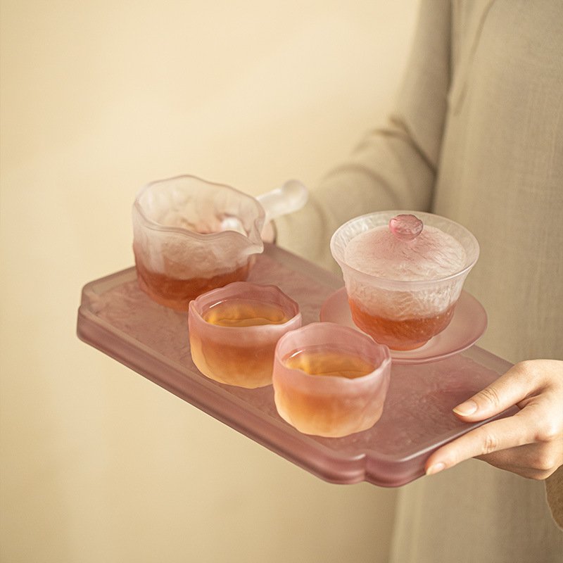 Chinese-style frosted purple glass tea set, including gaiwan, teacups, fairness cup, and tea tray, perfect for afternoon tea and Kung Fu tea.
